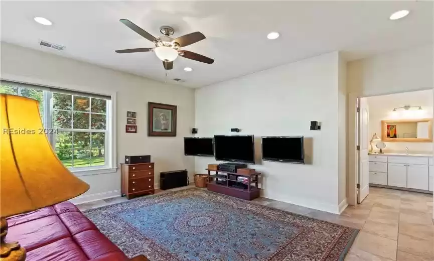 Porch / Sunroom with ceiling fans plus Patio overlooking Lake