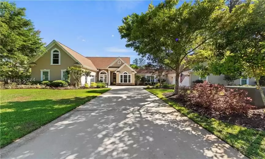 View of front of property with a front lawn