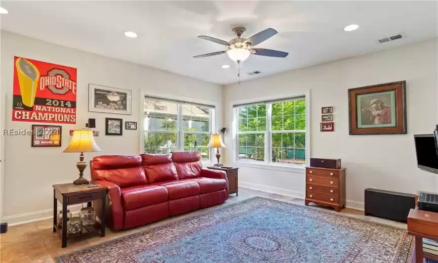 SECOND Primary Bedroom used as a Large Den, Tiled living room with ceiling fan, and Full Bath and walk-in closet