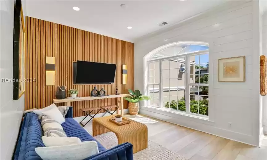 Entrance foyer with an inviting chandelier and 2nd living space