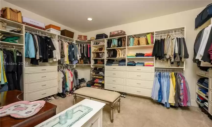 You don't often see a primary bedroom closet as big as this one and customized for great storage!