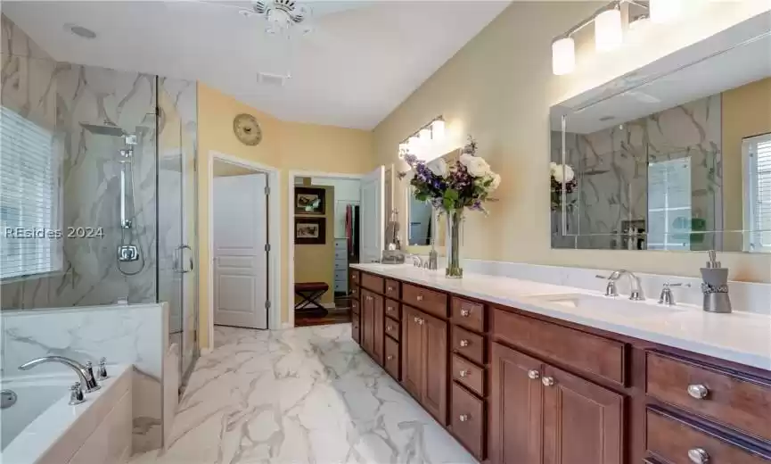 Primary Bathroom with new Quartz, New Shower and New Flooring.