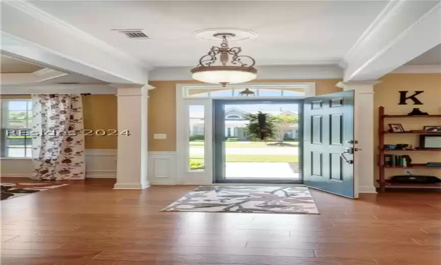 The Expansive Floor Plan with a Casual Dining area and view of the Fireplace.