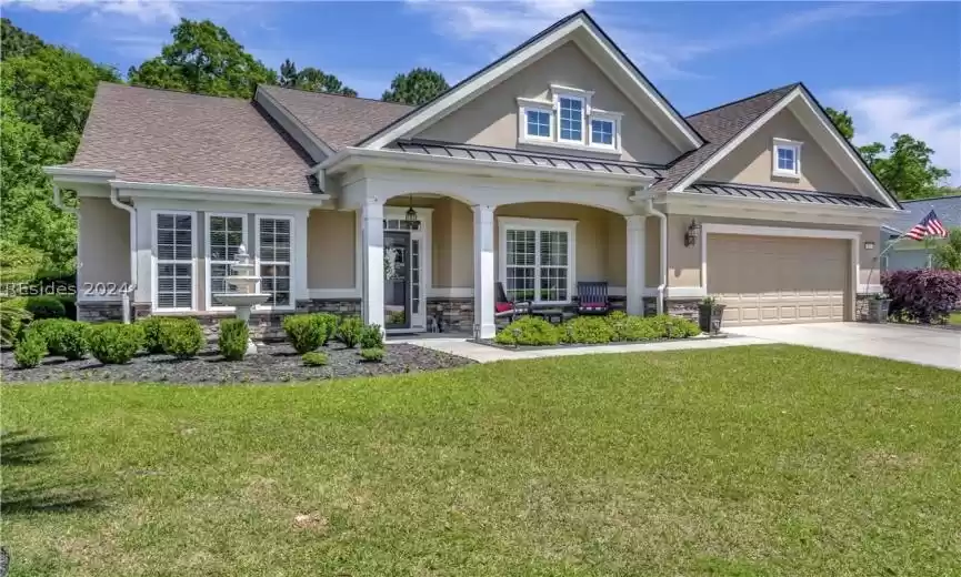 Lush Landscaping Surrounds this home.