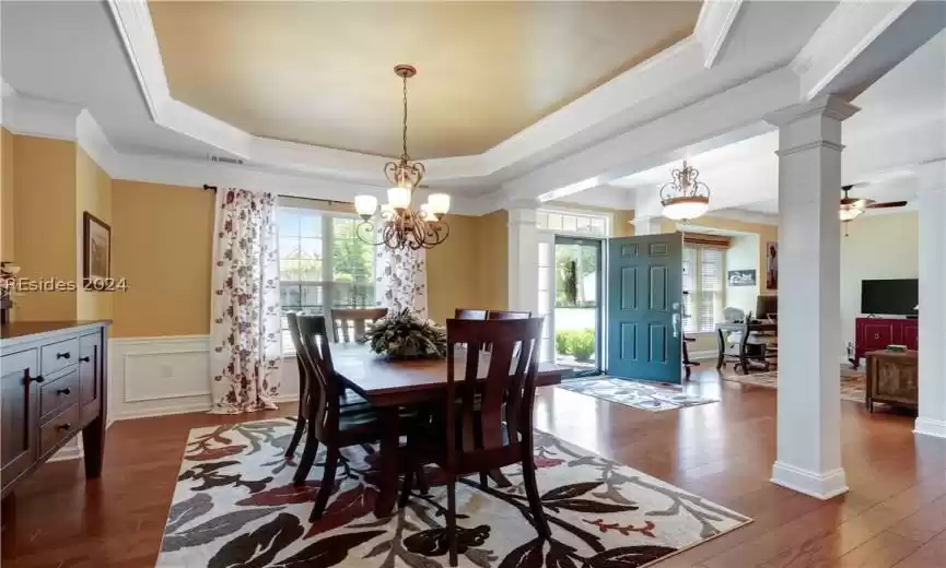 Gorgeous Dining Room with Butlers Pantry, Stunning Tray Ceiling and Columns.