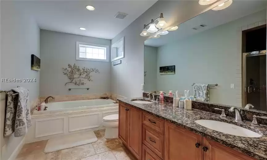 Primary Bath with Double Sinks, Jetted Tub and Tile Shower with Built-In Bench