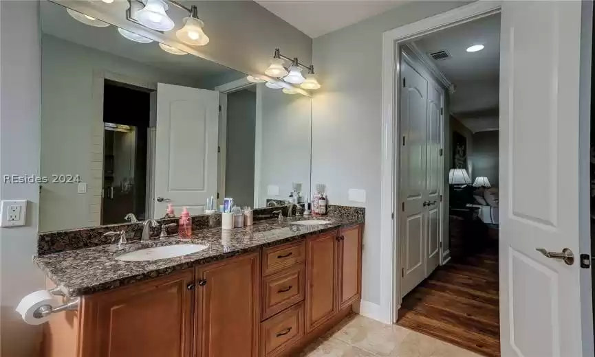 Primary Bath with Double Sinks, Jetted Tub and Tile Shower with Built-In Bench