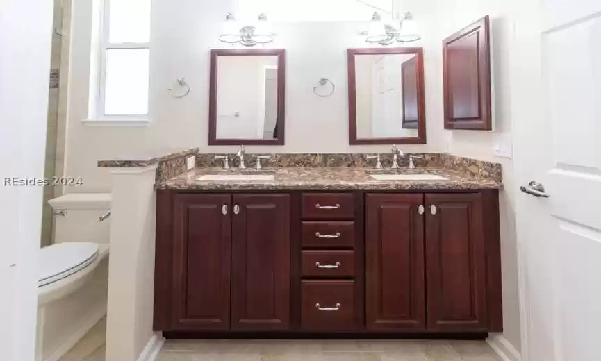 Large vanity with plenty of cabinet space.