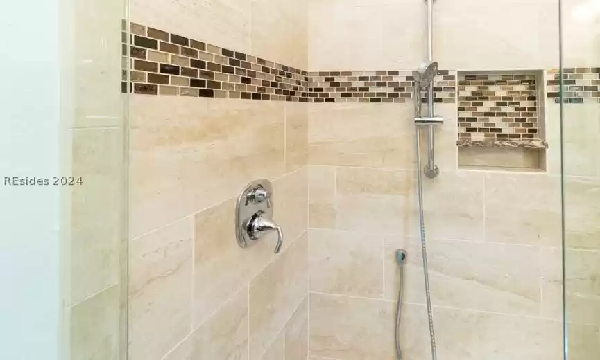 Custom tile work and upgraded hardware shown.