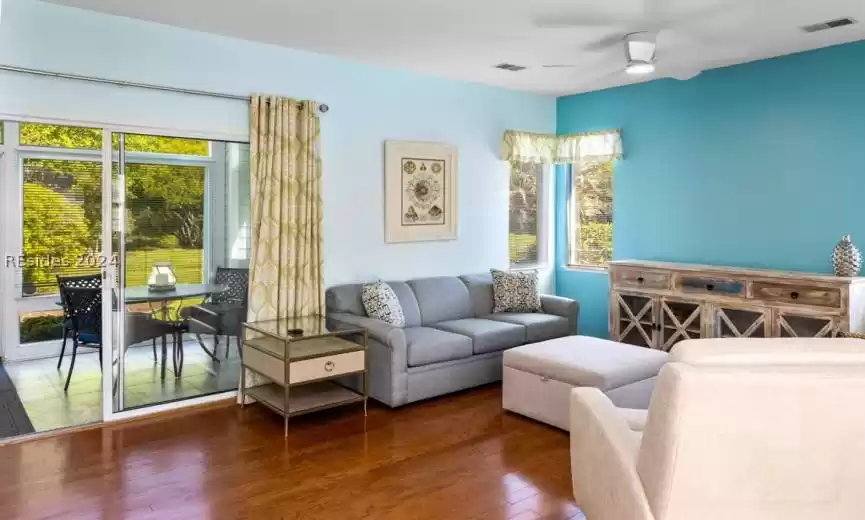 Living room and view of four season's room.