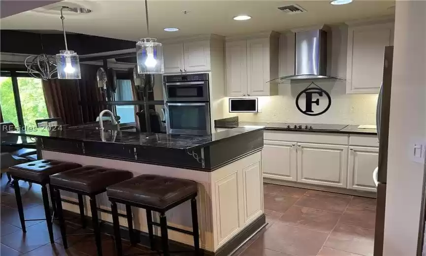 Kitchen with stainless steel appliances,