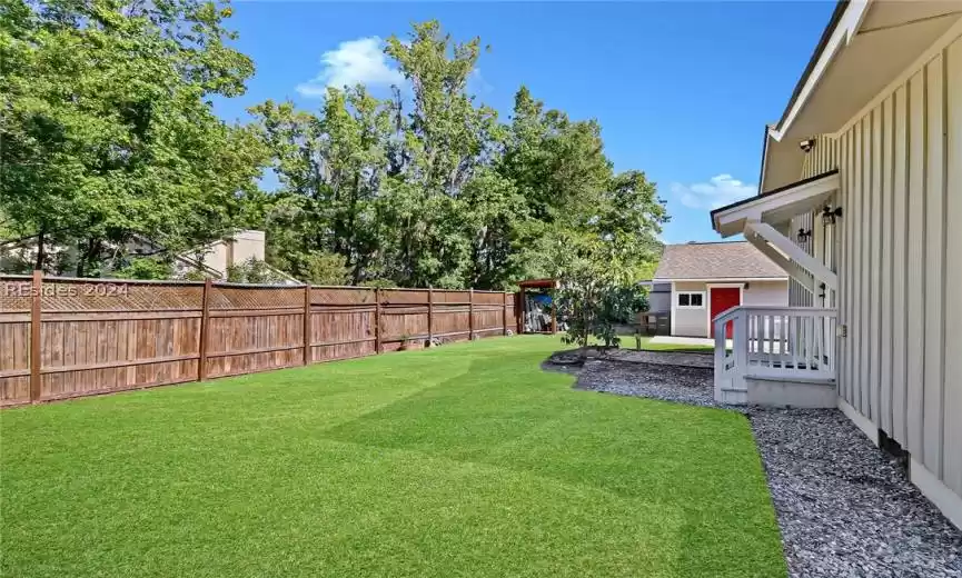 View of fenced in side yard