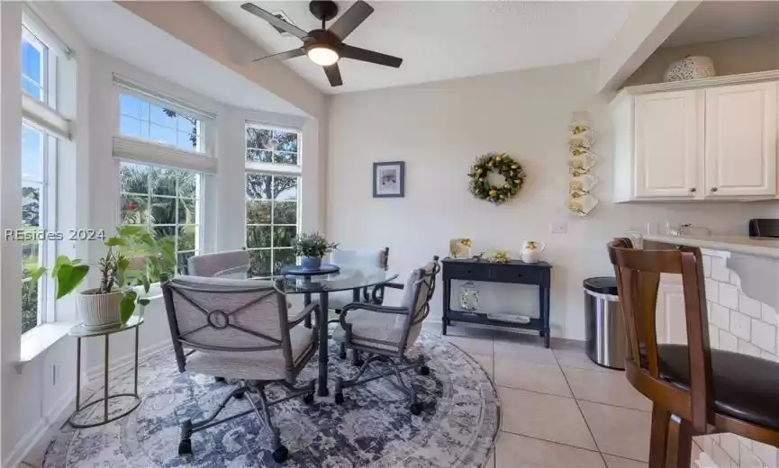 Casual dining area with the kitchen on the right