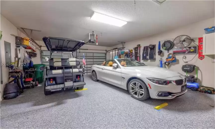 Roomy garage with a beautiful epoxy floor