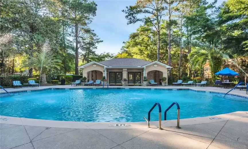 View of swimming pool with a patio area