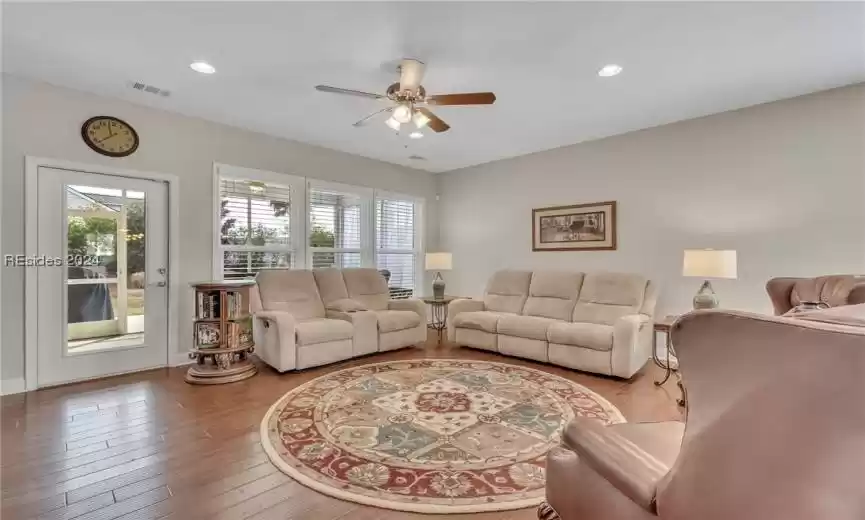 Main living area with door going out to screened porch