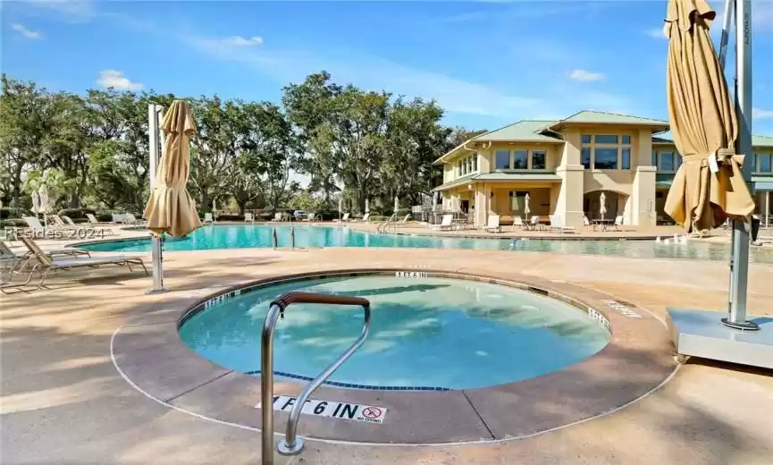 View of swimming pool with a patio area