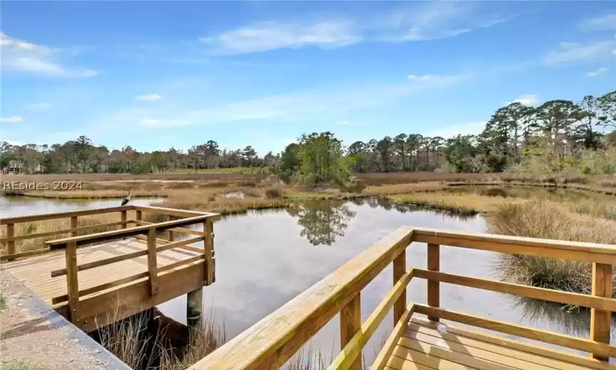 View of dock with a water view