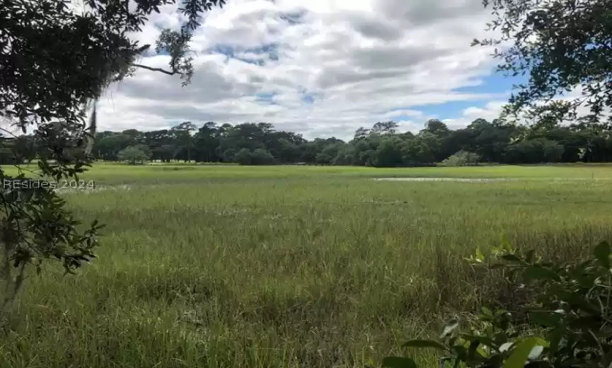 View over marsh to 11th hole.