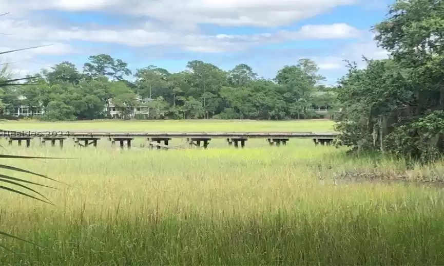 Bridge from 11th green to 12th tee. Homesite is directly ahead.