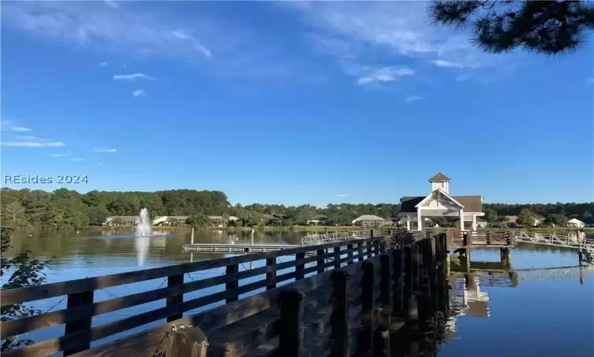 Dock area featuring a water view