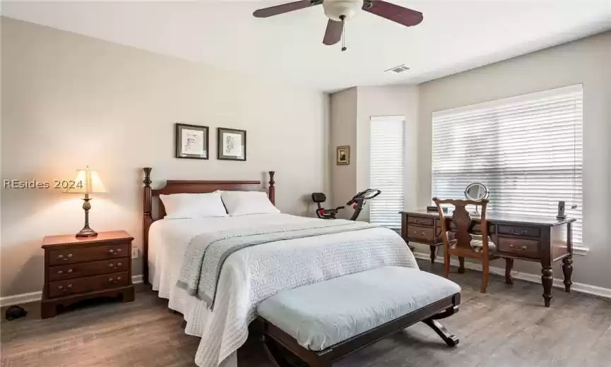 Primary bedroom with bay window.