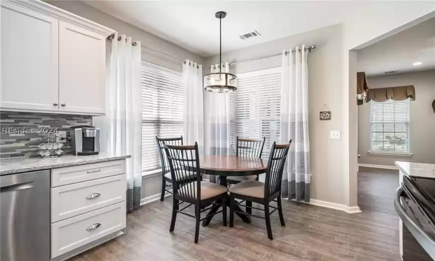 Windows allow for kitchen to be light and bright.