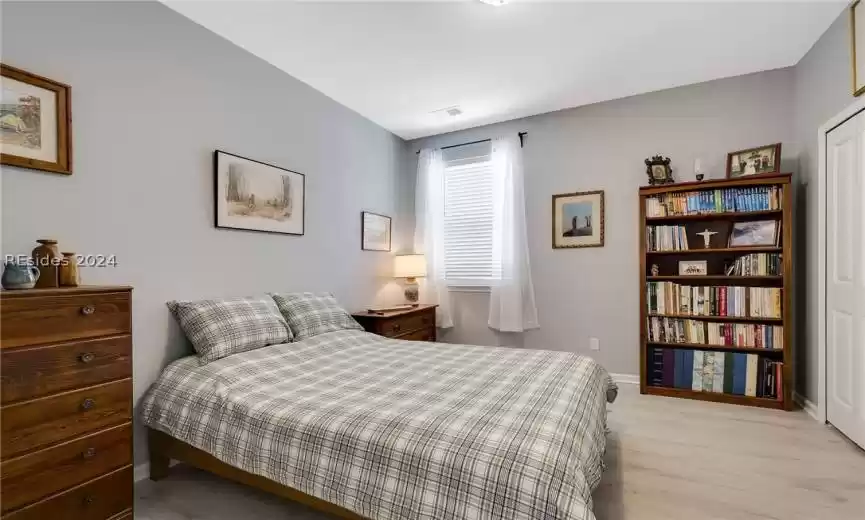 Bedroom with light wood-type flooring