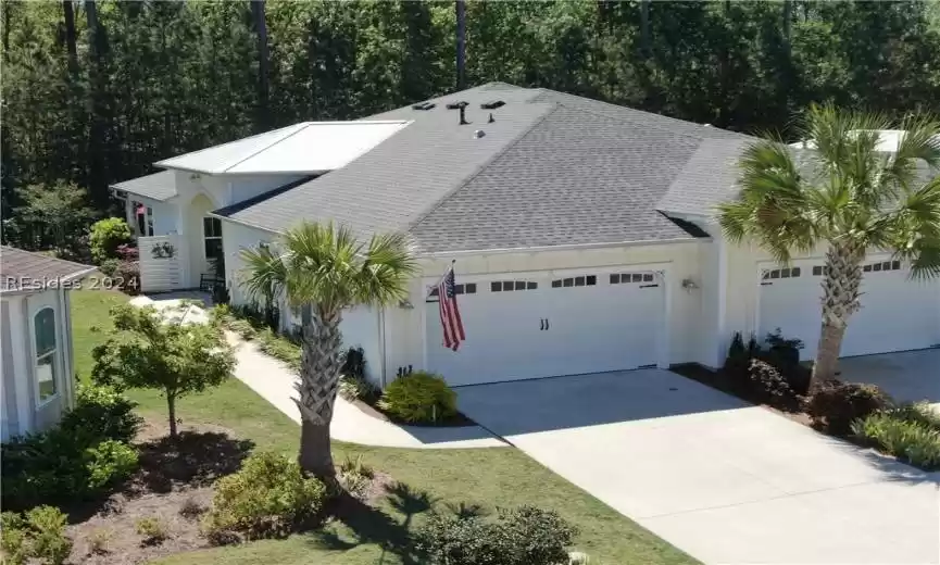 View of front of home featuring a garage