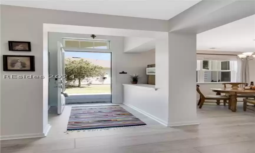 Foyer with light wood-type flooring