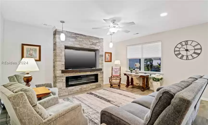 Stone accent wall with linear electric fireplace