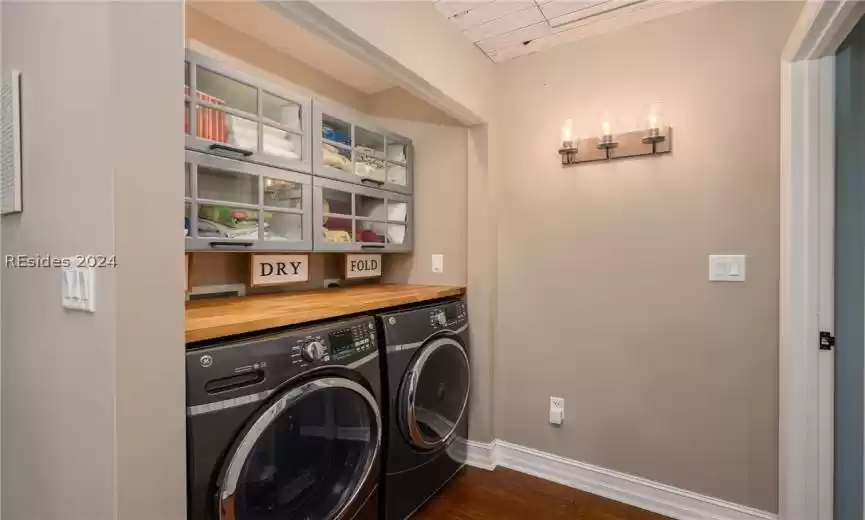 Adorable and accessible laundry area directly off the primary suite.