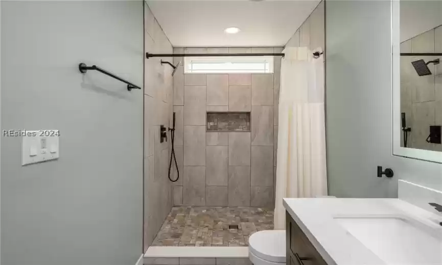 Upgraded primary ensuite with tile shower & backlit mirror